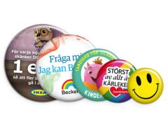 Reklamknappar. Baksidan är med nål som fäste